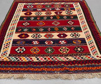 A CARPET, Persian kilim, ca 240 x 167 cm.