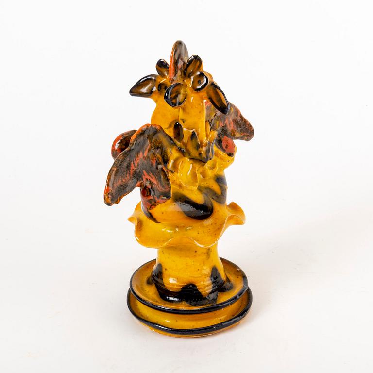 A signed Ulrica Hydman-Vallien stoneware figurine.