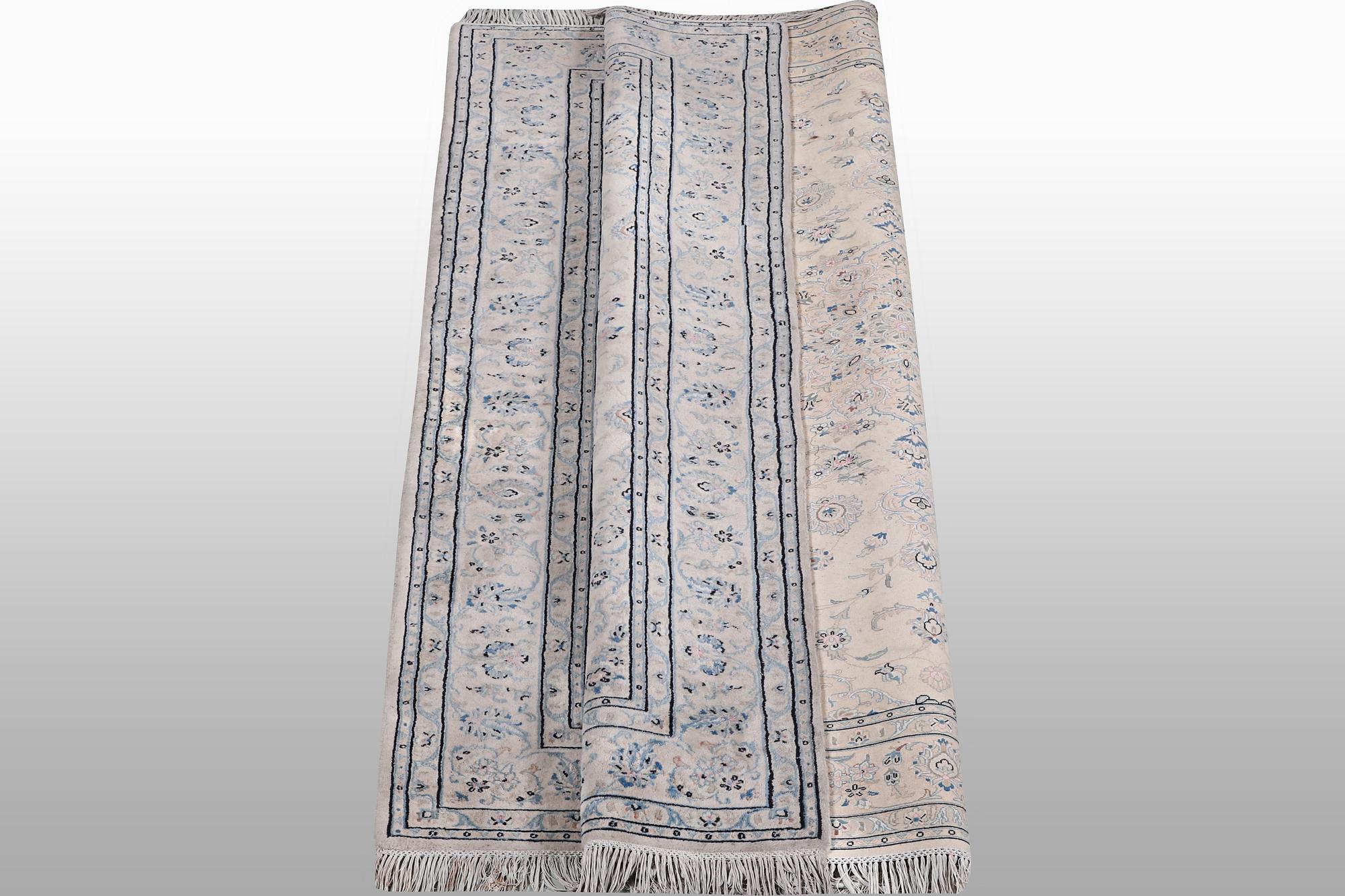 A rug, Nain, part silk, 6 Laa, ca 240 x 165 cm.
