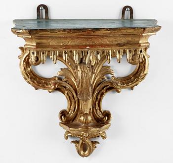 A 19th century Rococo style console.