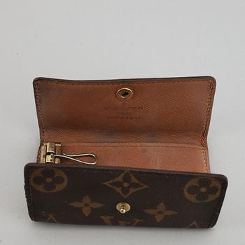 LOUIS VUITTON, a 'Trousse toilette 28' toilet bag and a key case.