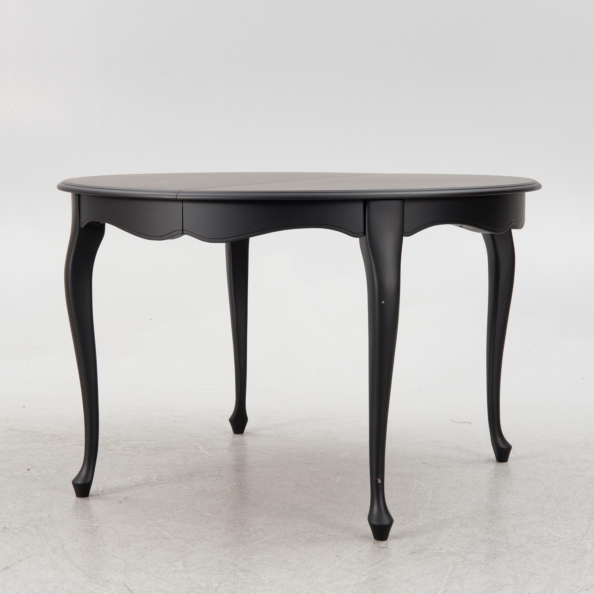 A rococo style dining table, second half oif the 20th century.