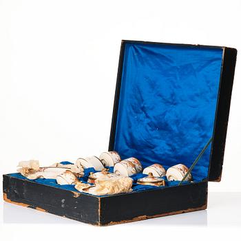 A box with a Japanese satsuma tea service, early 20th Century. (15 pieces).