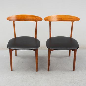 KURT ØSTERVIG, a teak dining suite with a round table and six chairs, Brande Möbelindustri, Denmark.