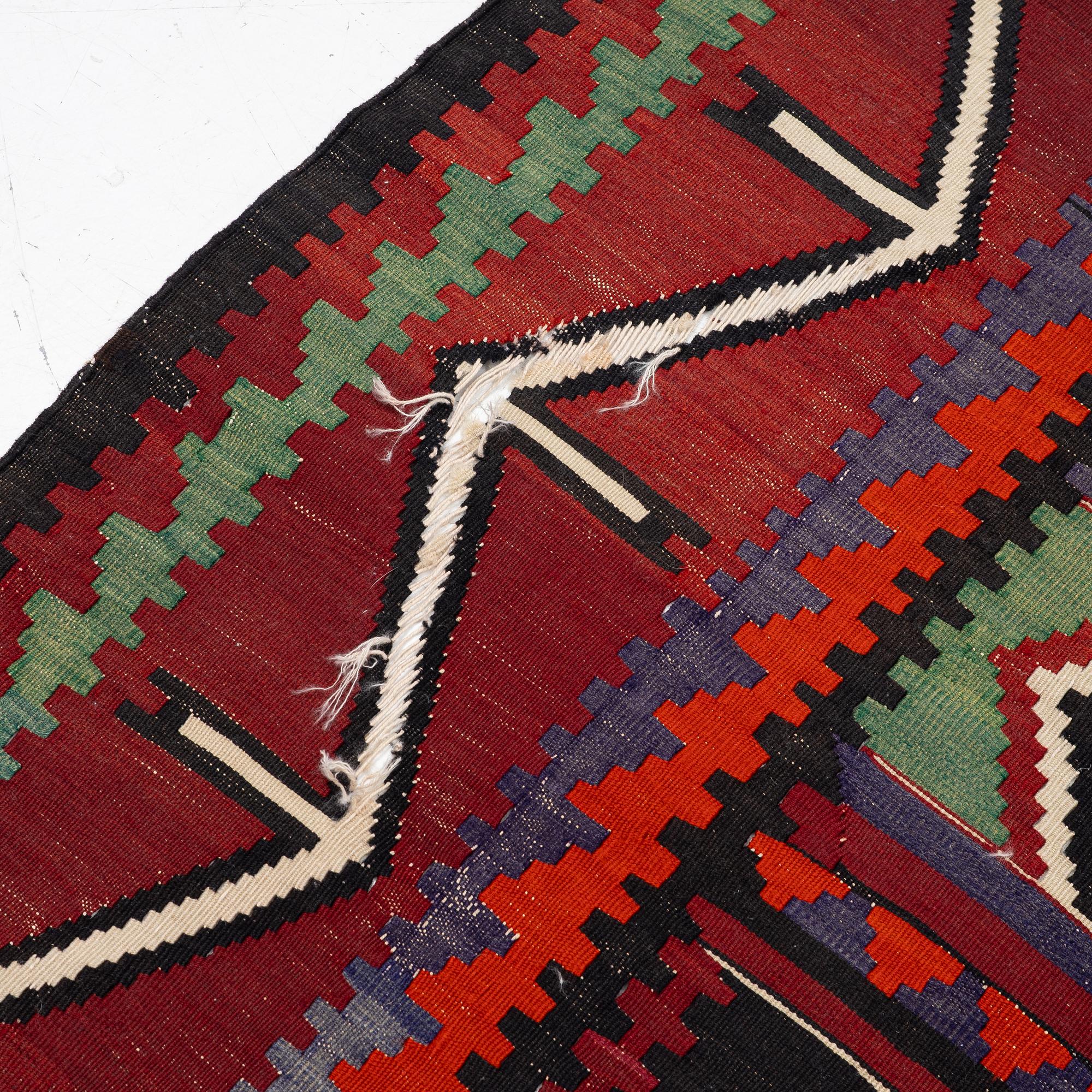 A Kelim carpet, c. 300 x 170 cm.