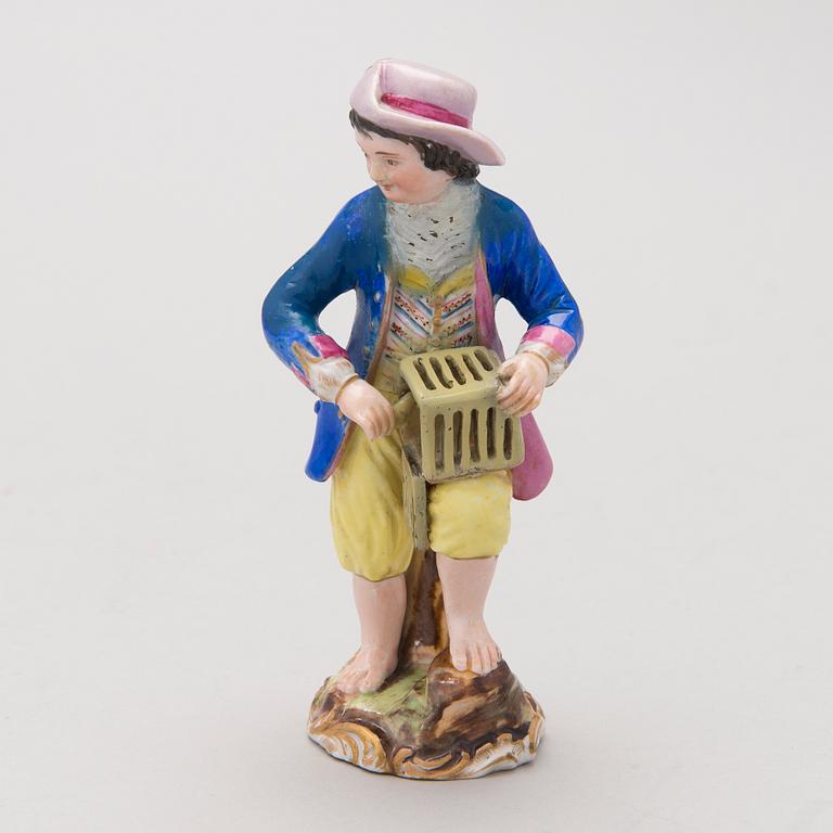 A MID 19TH CENTURY RUSSIAN POPOV FACTORY PORCELAIN FIGURINE.