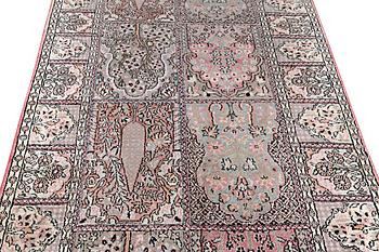 A Kashmir runner carpet, silk, c. 364 x 97 cm.