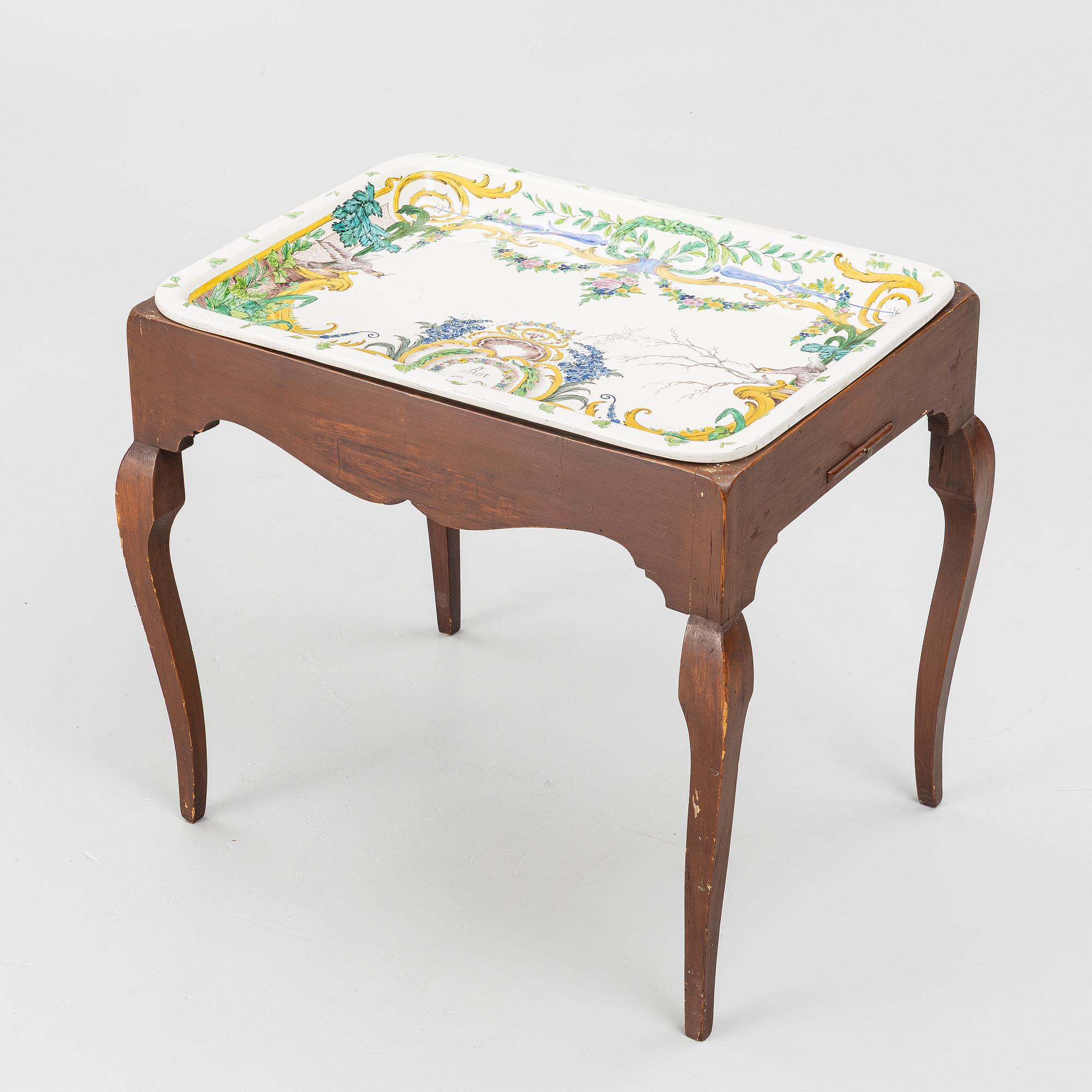 A Swedish rococo tea table with an associated top, 18th and 20th century.