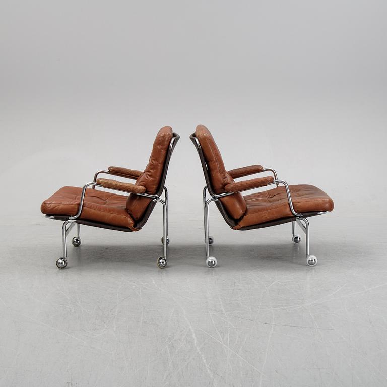 A pair of 'Karin' easy chairs by Bruno Mathsson for Dux, designed 1969.