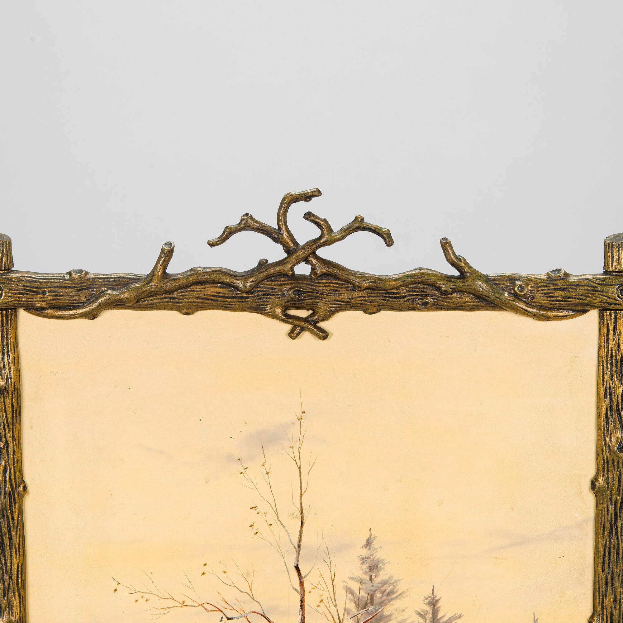 A late 19th-century fireplace screen.