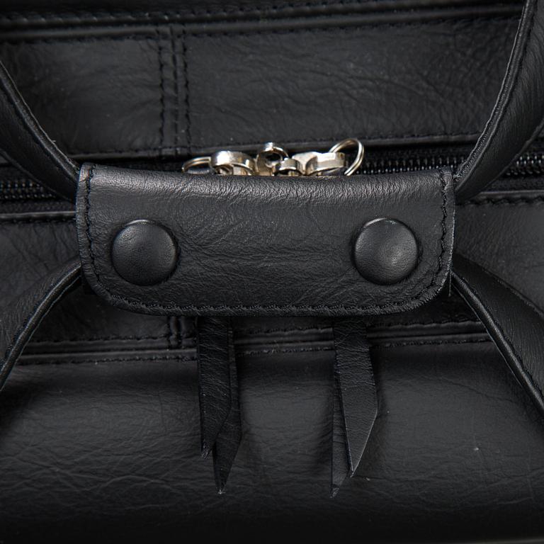 Five brack leather bags from Schedoni, Italy. For Ferrari 456.