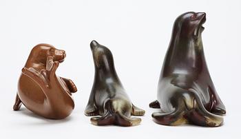 Three Gunnar Nylund stoneware figures of seals, Rörstrand.