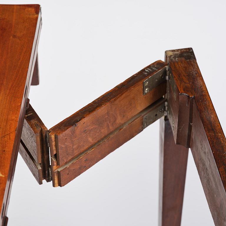 A Gustavian 'concertina action' mahogany games table by Georg Haupt (master in Stockholm 1770-84).