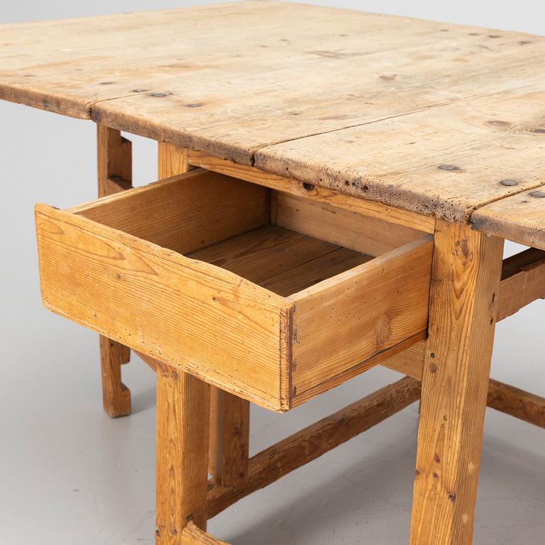A 19th century gate-leg table.