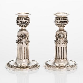 A pair of Saglier Frères silver plated Louis XVI-style candlesticks from around year 1900.