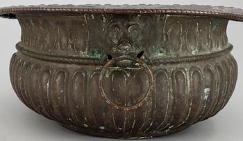 A Baroque copper wine cooler.