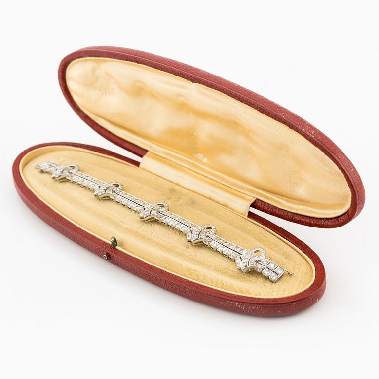 Armband platina med runda briljant, åttkant- och baguetteslipade diamanter, Gübelin.