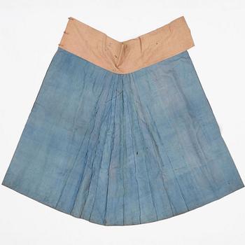 A Chinese skirt and a group of textiles, late Qing dynasty.