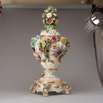 A large Meissen porcelain flower-encrusted pot-pourri vase, cover and stand, late 19th century.