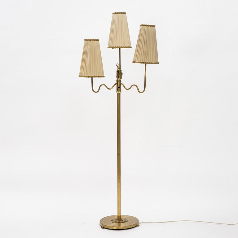 A Swedish Grace brass floor lamp, first part of the 20th Century.