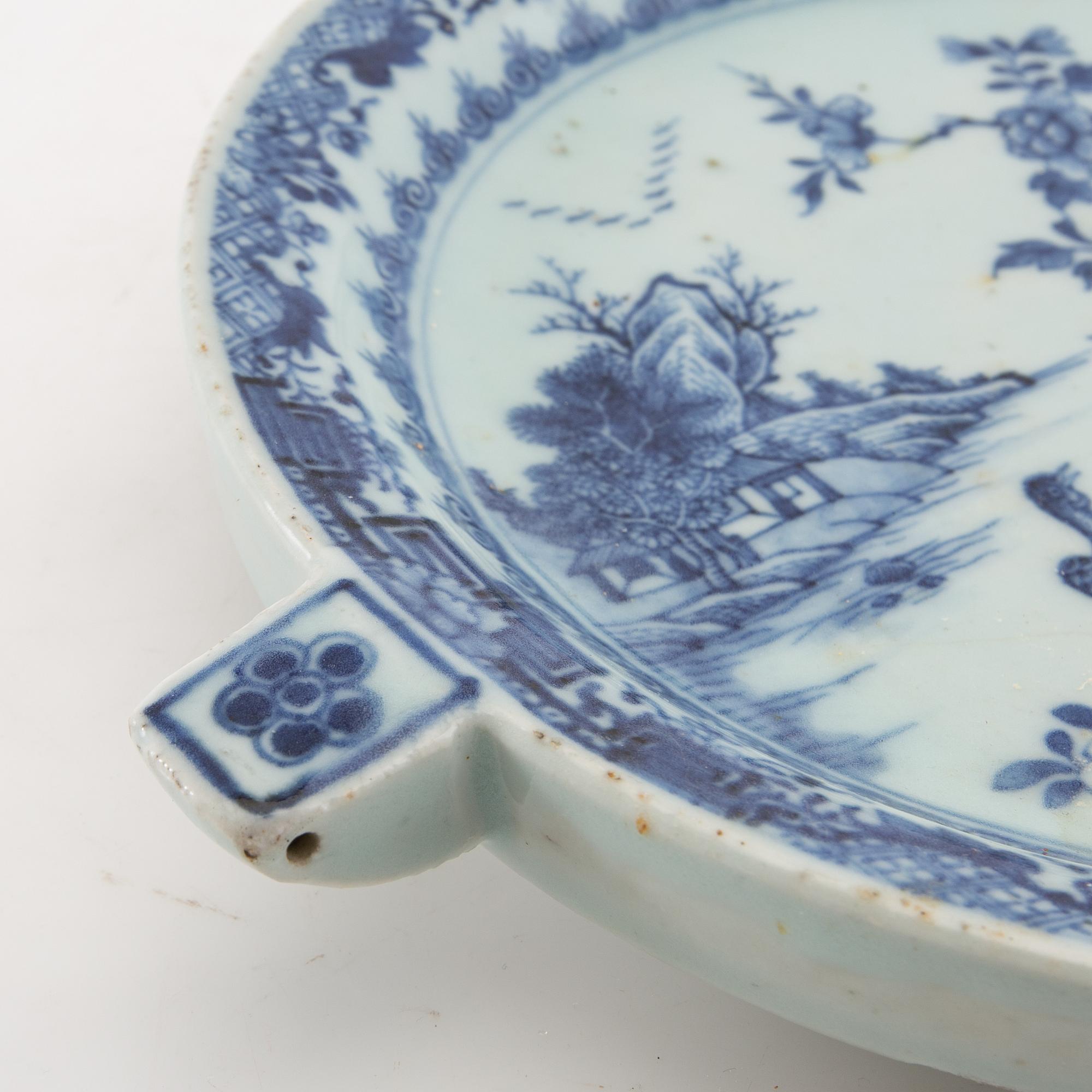 A Chinese blue and white hot water dish, Qing dynasty, Qianlong (1736-95).
