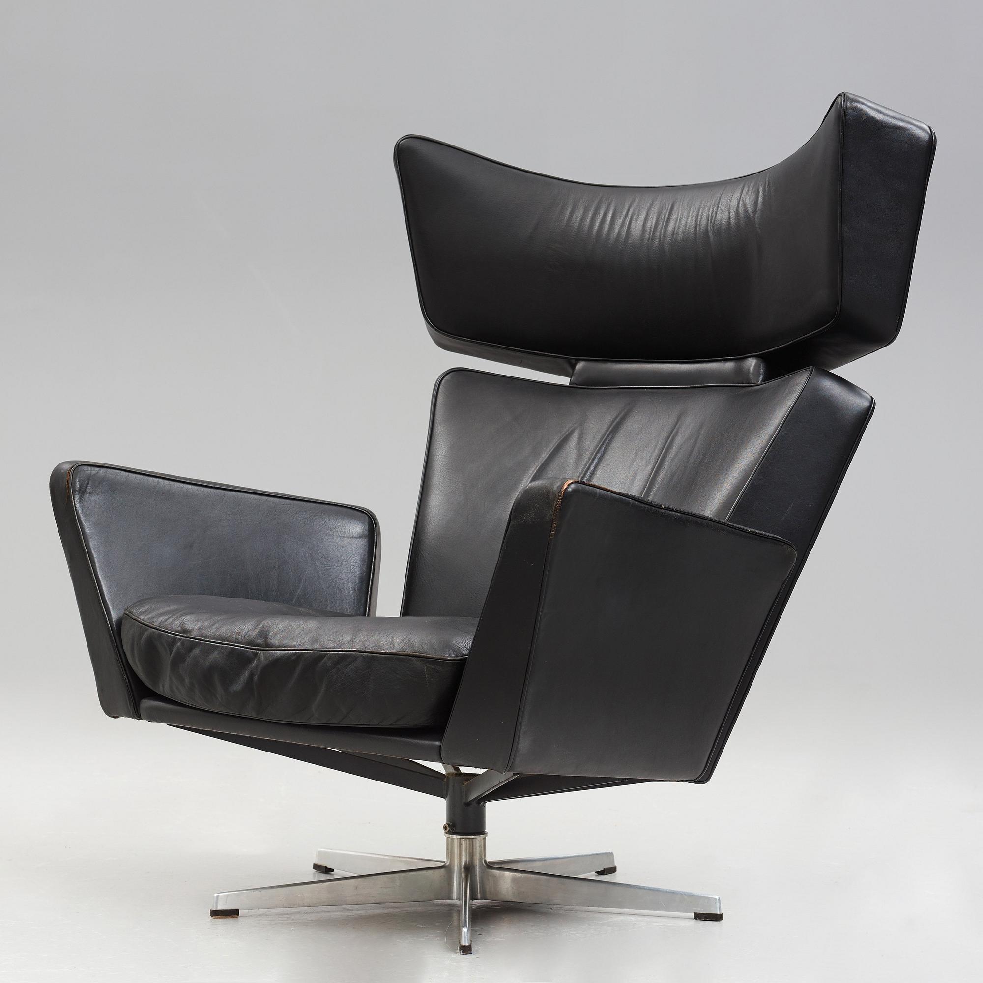 Arne Jacobsen, a black leather and aluminium "Ox-Chair", Denmark 1966.