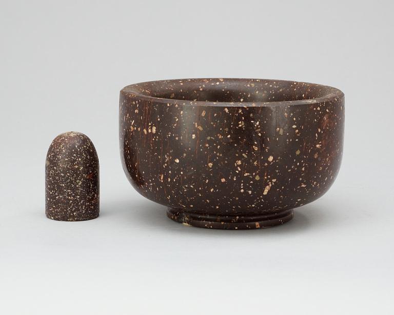 A Swedish 19th century porphyry mortar and pestle.