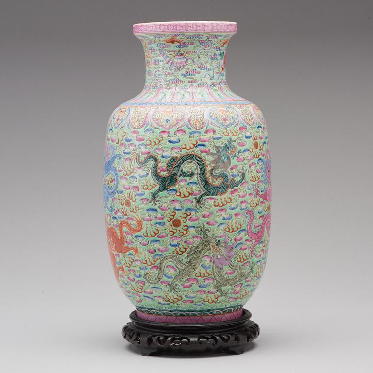 A famille rose and green ground vase, Republic (1912-49), with Qianlong six character mark.