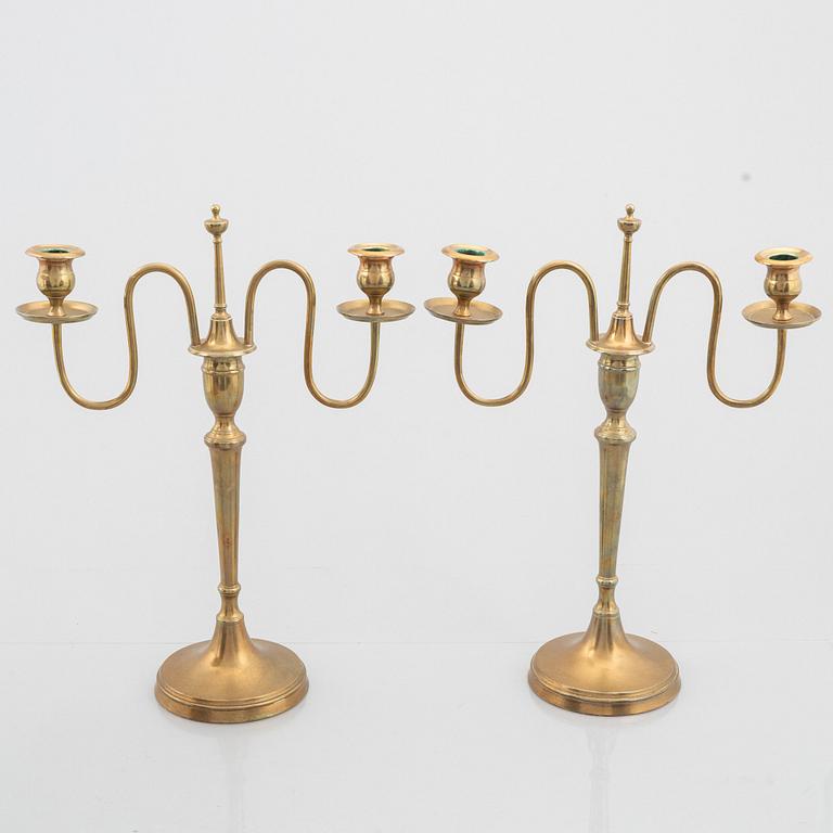 Skultuna Messingsbruk, a pair of 'N 55' brass candelabra, second half of the 19th Century.