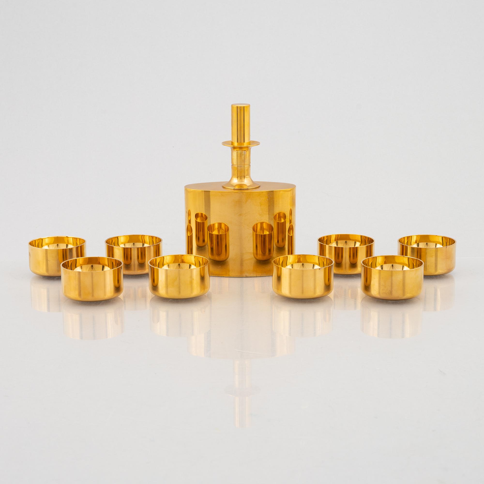 Pierre Forssell, eight gilded cups and a bottle, in a box, Skultuna, Sweden.