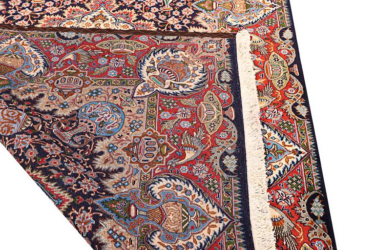 A Kashmar carpet, a. 300 x 200 cm.