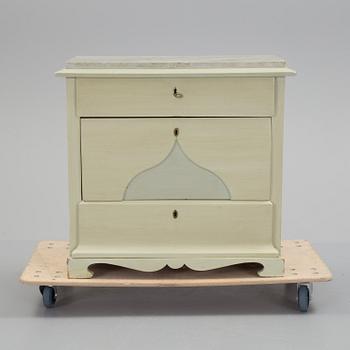 A mid 19th century painted chest of drawers.