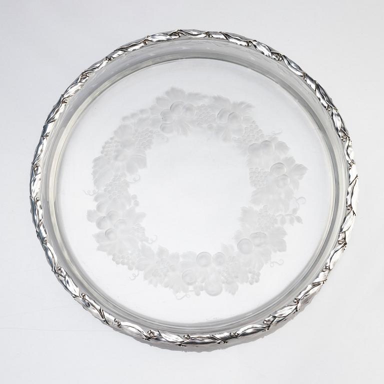 An unusually large cut glass dish with silver mounted rim, W.A. Bolin, Stockholm 1919.