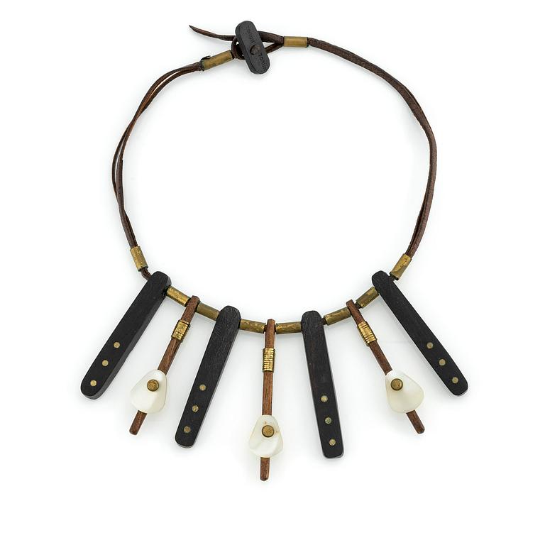 Vivianna Torun Bülow-Hübe, a necklace, wood, leather, mother-of-pearl and brass, most likely 1950's.