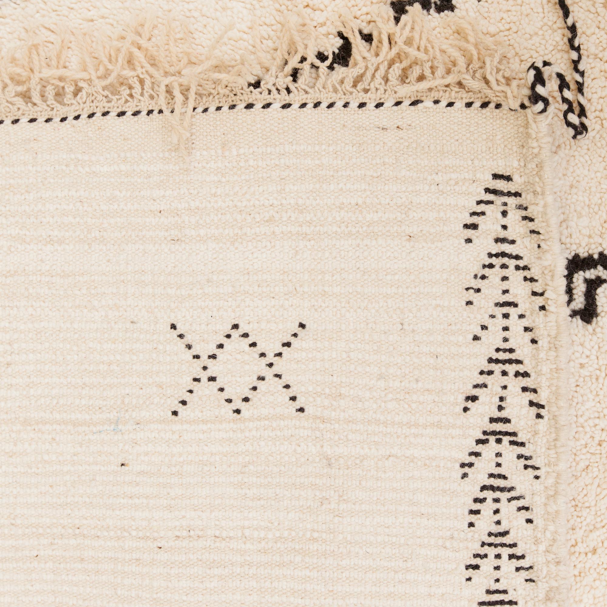 A MOROCCAN BENI OURAIN CARPET. Circa 490x305 cm.