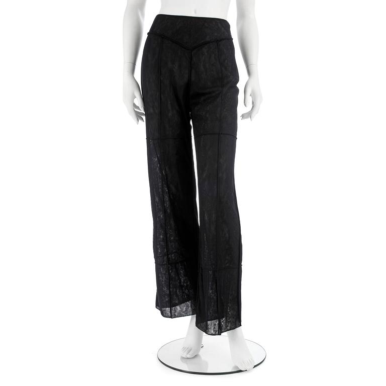 CHANEL, a black mesh evening pant.