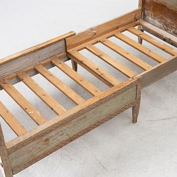 A Gustavian carved bedframe, late 18th century.
