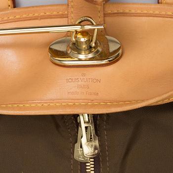 "Housse Porte-habits"  Louis Vuitton.