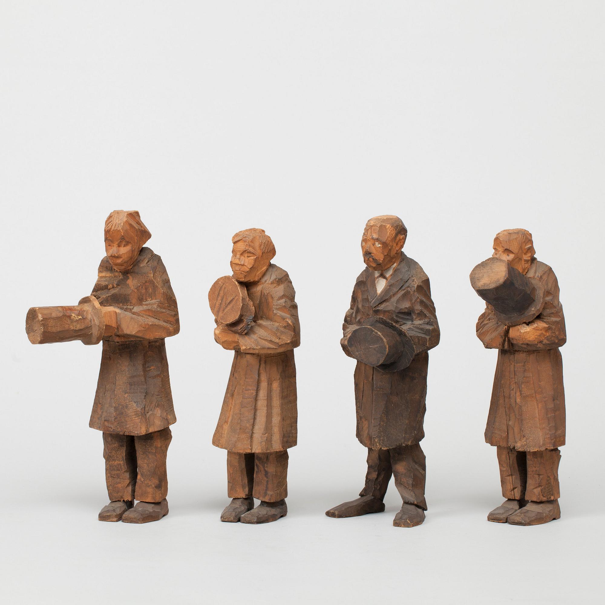 Axel Petersson Döderhultarn, "Begravning" (= The funeral) (9 pieces).