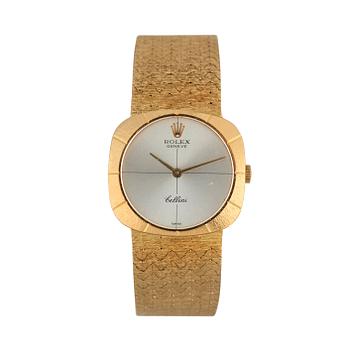211. Rolex - Cellini. Guld. Manuell. 24,5 x 22,5 mm.