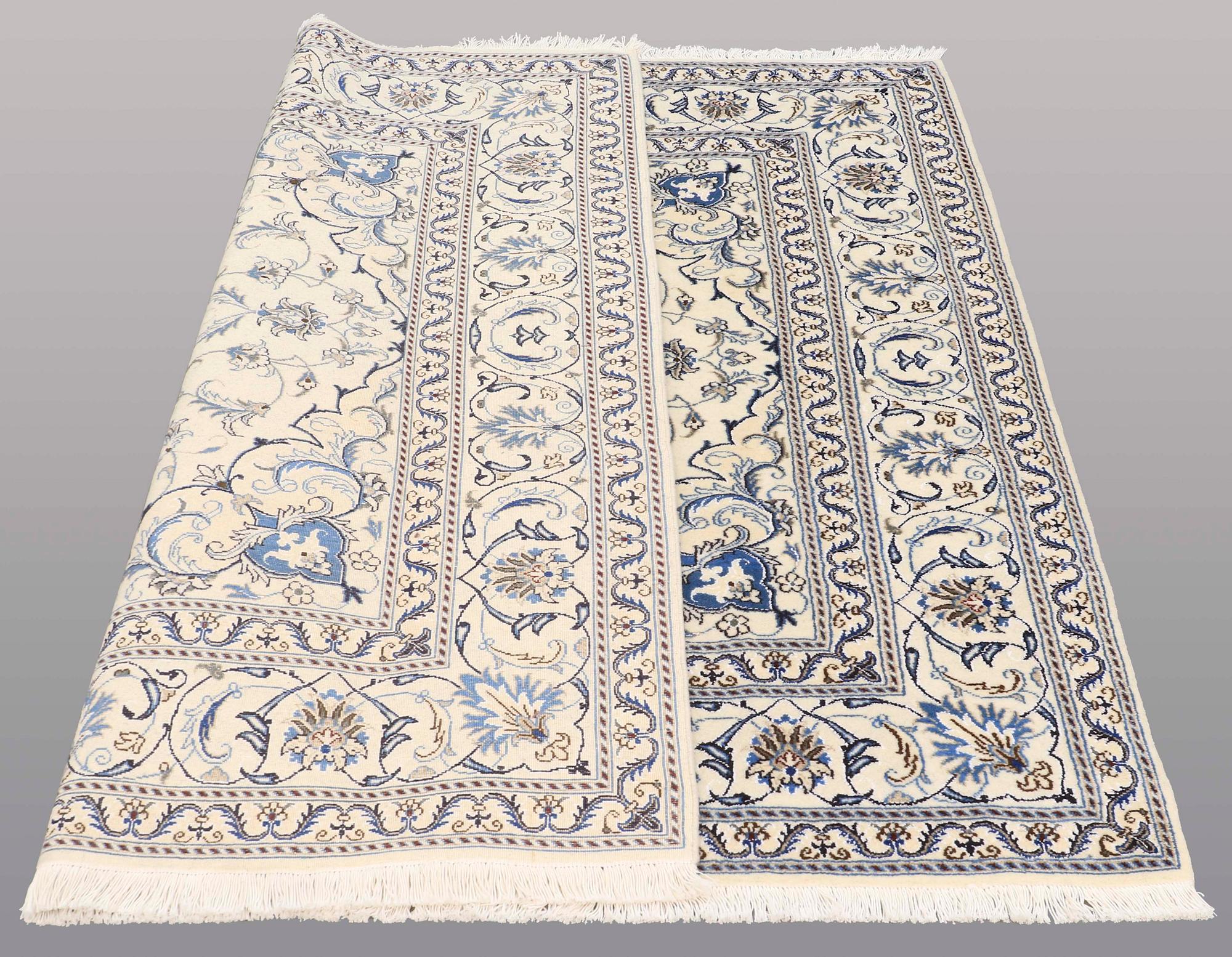 A rug, Nain part silk, ca 197 x 197 cm.
