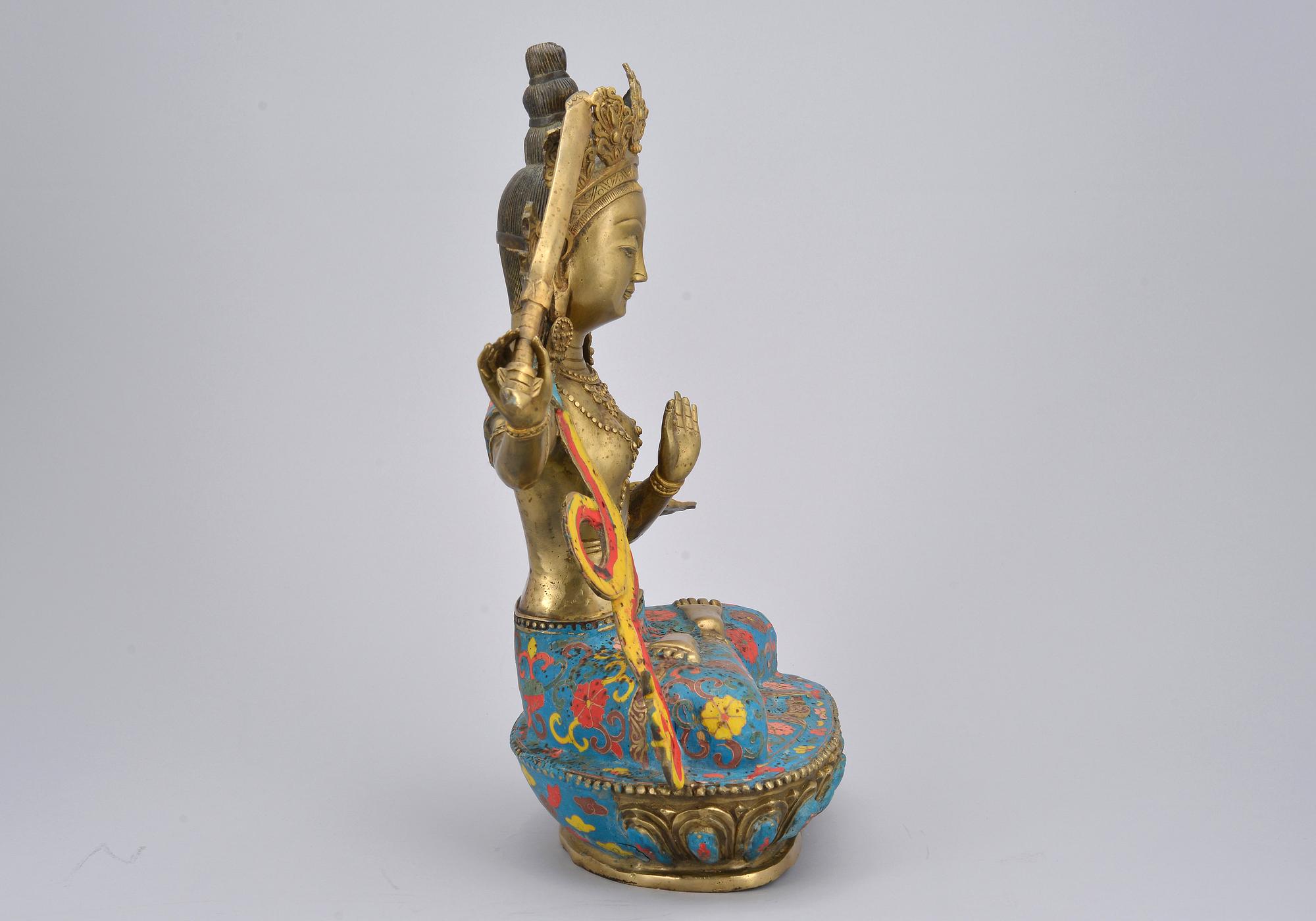 SKULPTUR, Kina, Manjushri, målad brons. 1900-talets andra hälft.