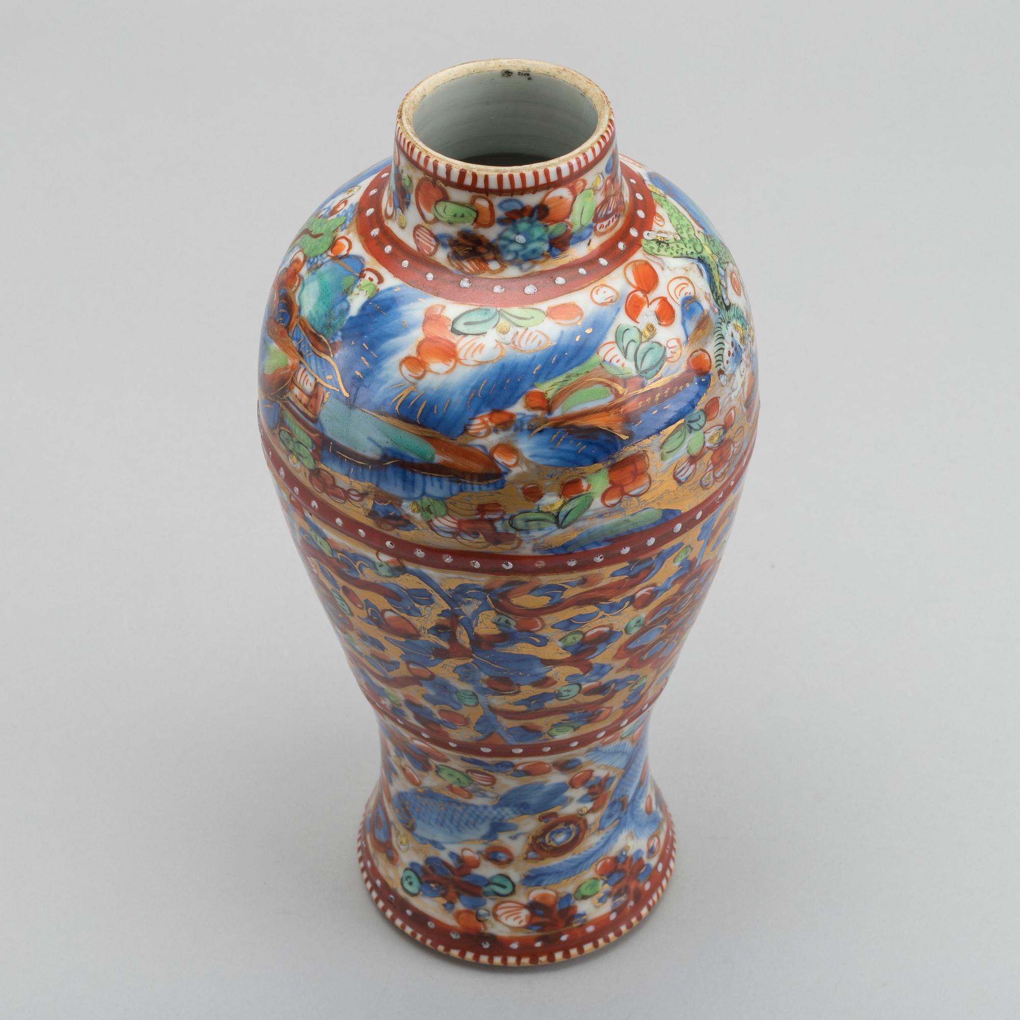 A Chinese clobbered 18th century porcelain vase, height ca 24 cm.