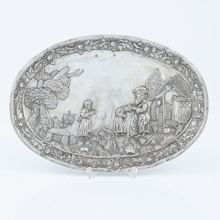 A baroque-style silver dish, 19th century.