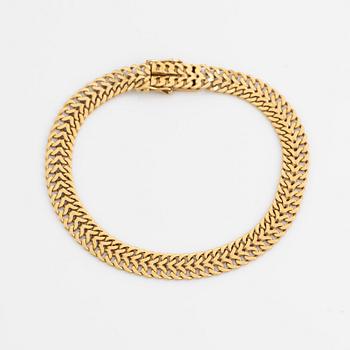 Armlänk, 18K guld.