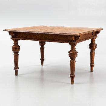 A dining table, late 19th Century.