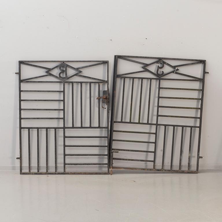 A pair of cast iron gates from the first half of the 20th Century.