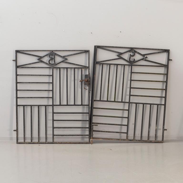 A pair of cast iron gates from the first half of the 20th Century.