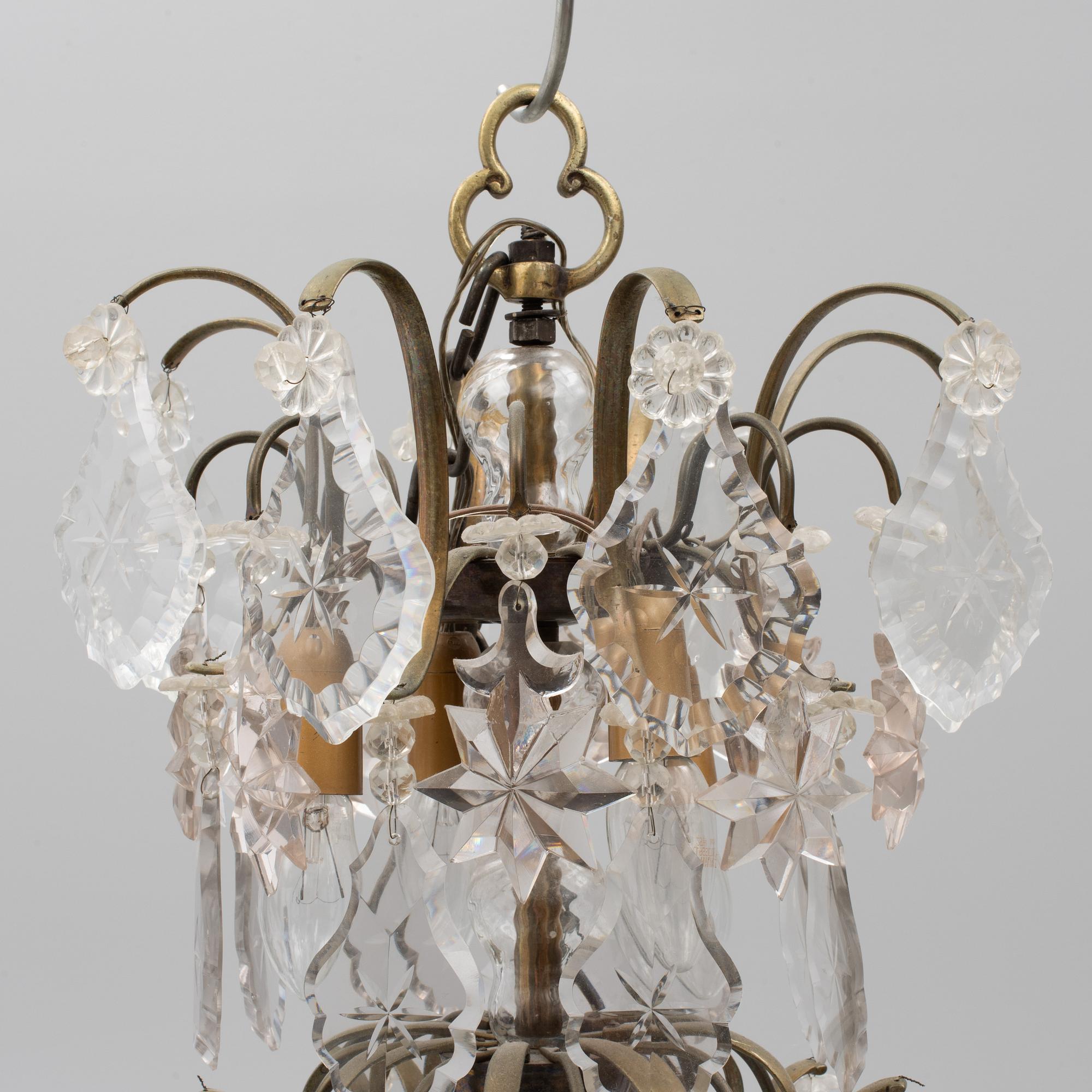 A Rococo style chandelier, early 20th century.