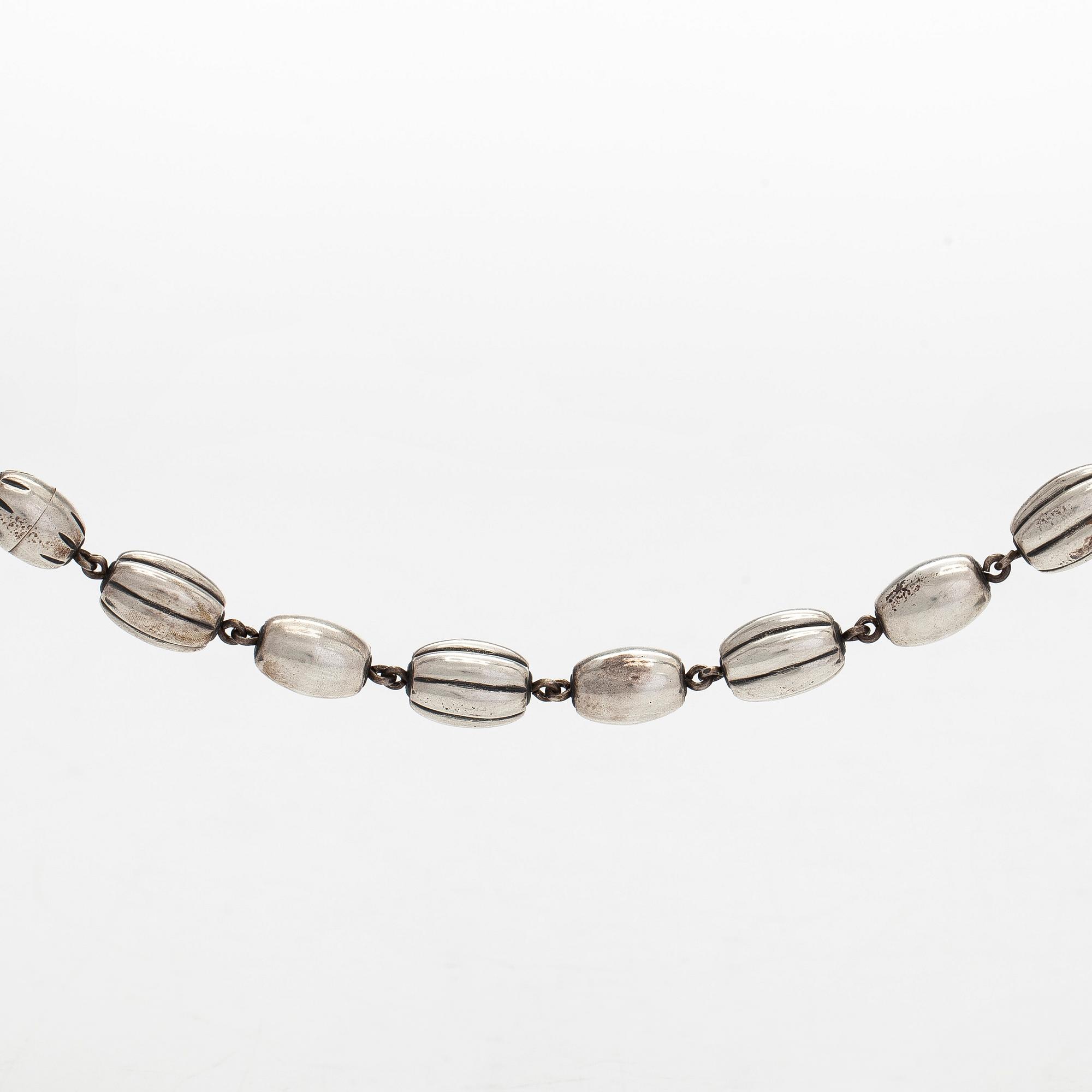 Kalevala Koru, A sterling silver necklace bracelet and earrings, "The Treasure from Halikko" 1979 and 1988.
